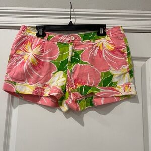 Lilly Pulitzer "Palm Beach Fit" shorts in a pink and green floral print.